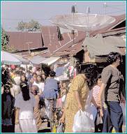 Satelite dishes behind market