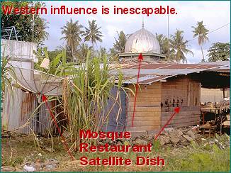 Satelite dish behind restaurant